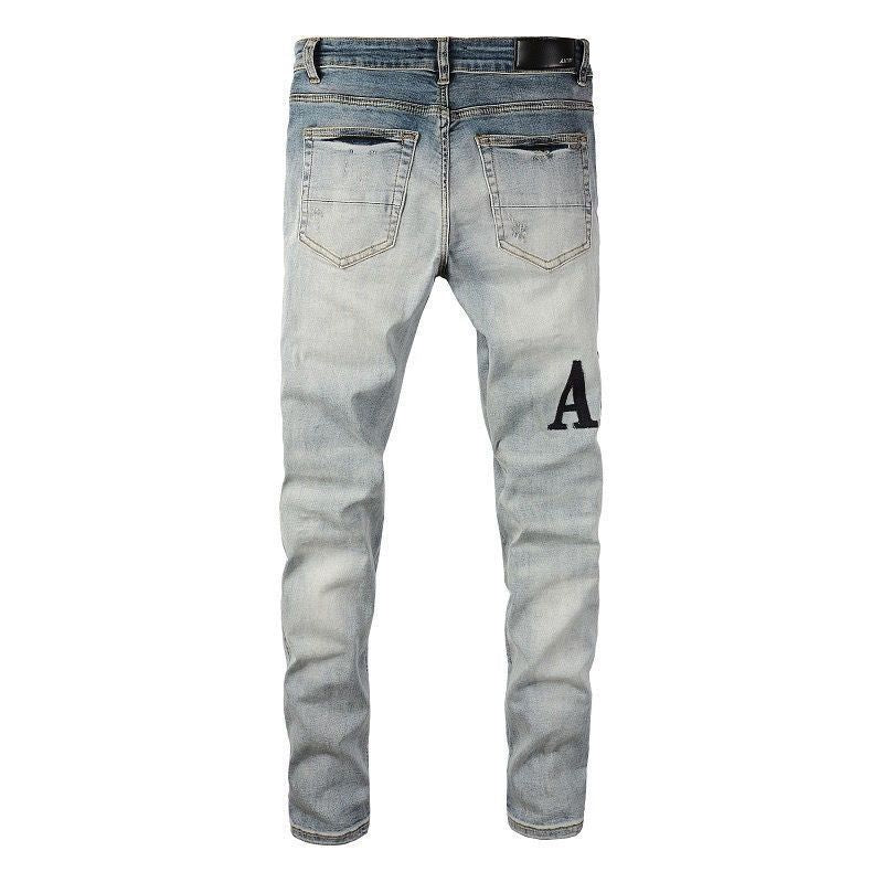 Amiri Distressed Patch Jeans