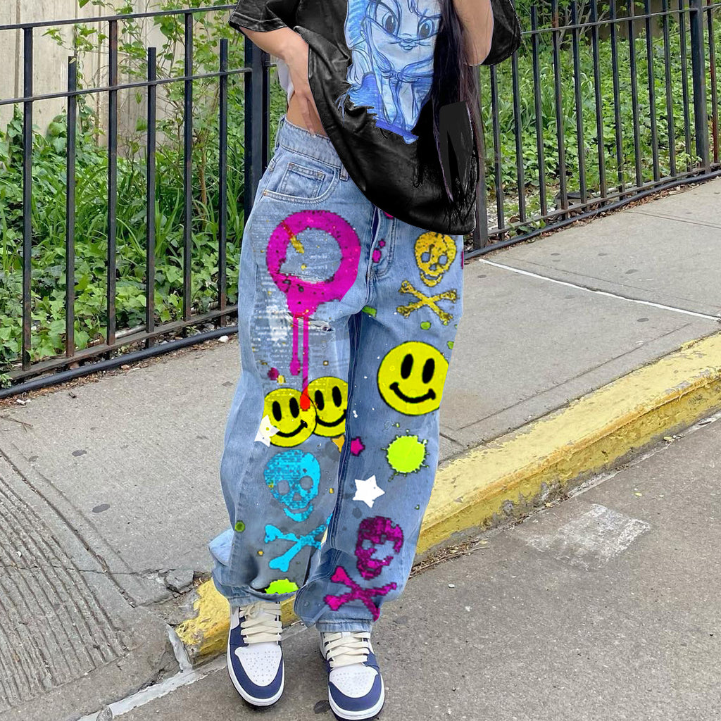 High-waisted printed denim pants with smiling faces