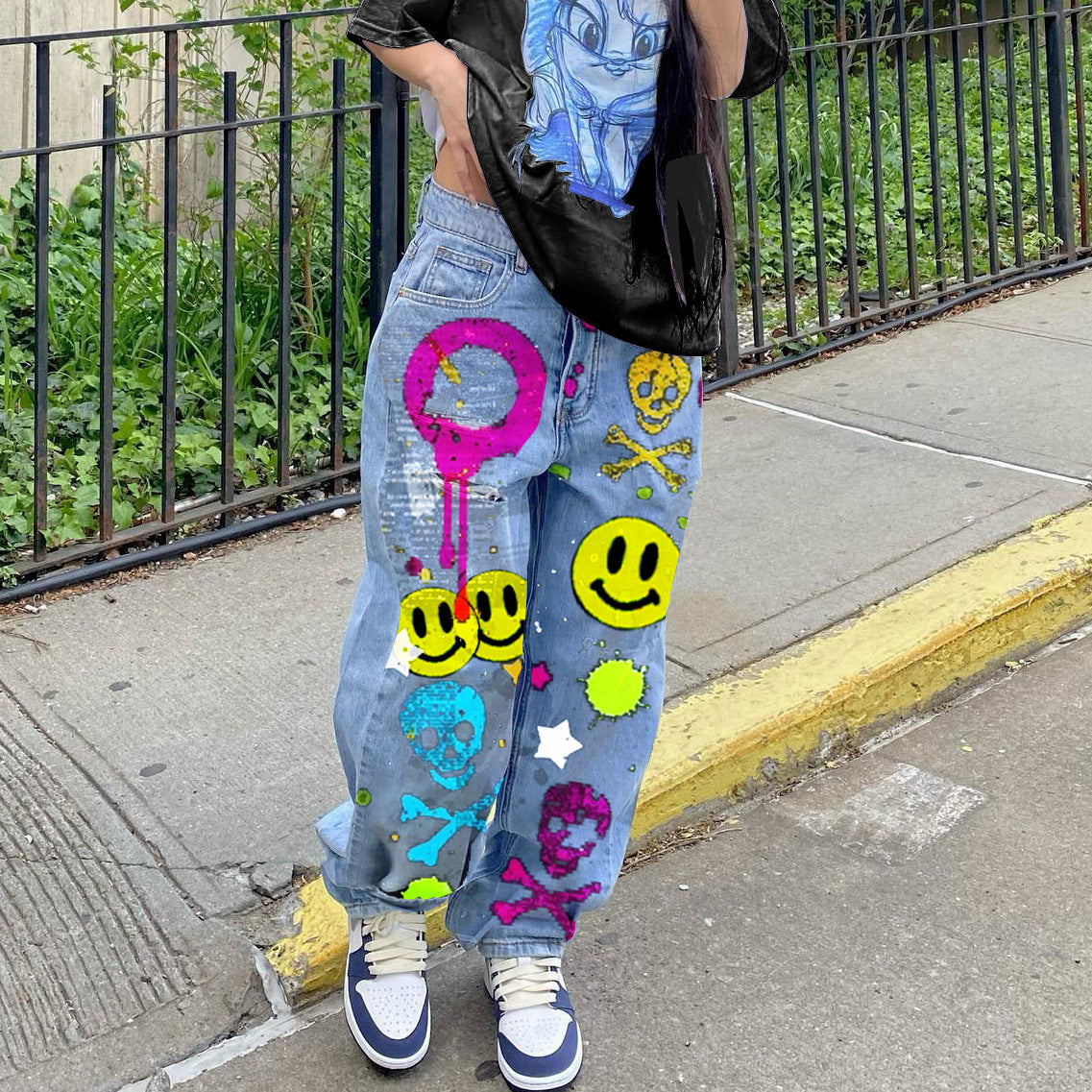 High-waisted printed denim pants with smiling faces