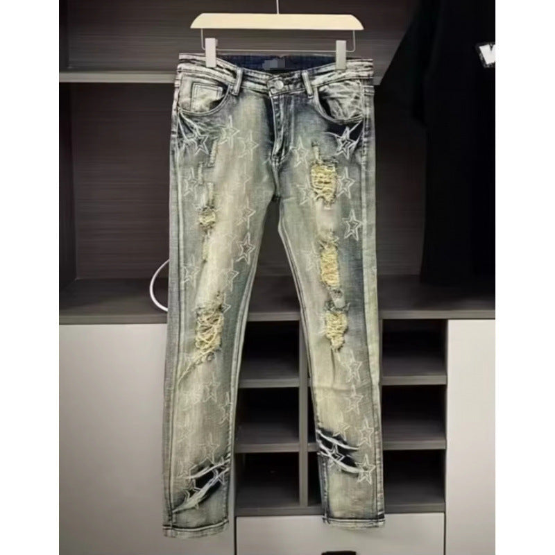 Amiri Straight-leg patchwork embroidered jeans