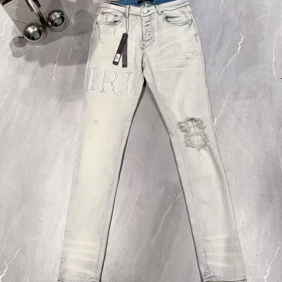 Amiri Distressed Patch Jeans