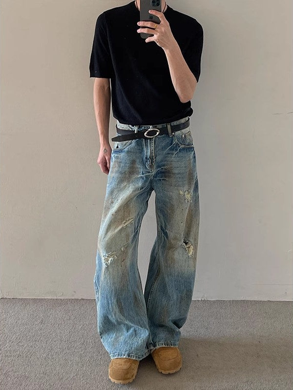 Wasteland style dirty washed effect jeans