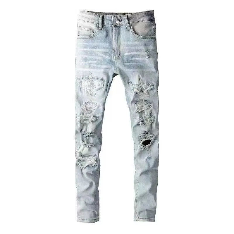 Amiri Straight-leg patchwork embroidered jeans