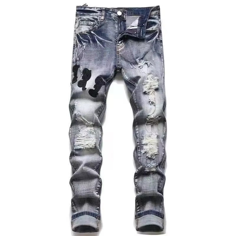Amiri Straight-leg patchwork embroidered jeans