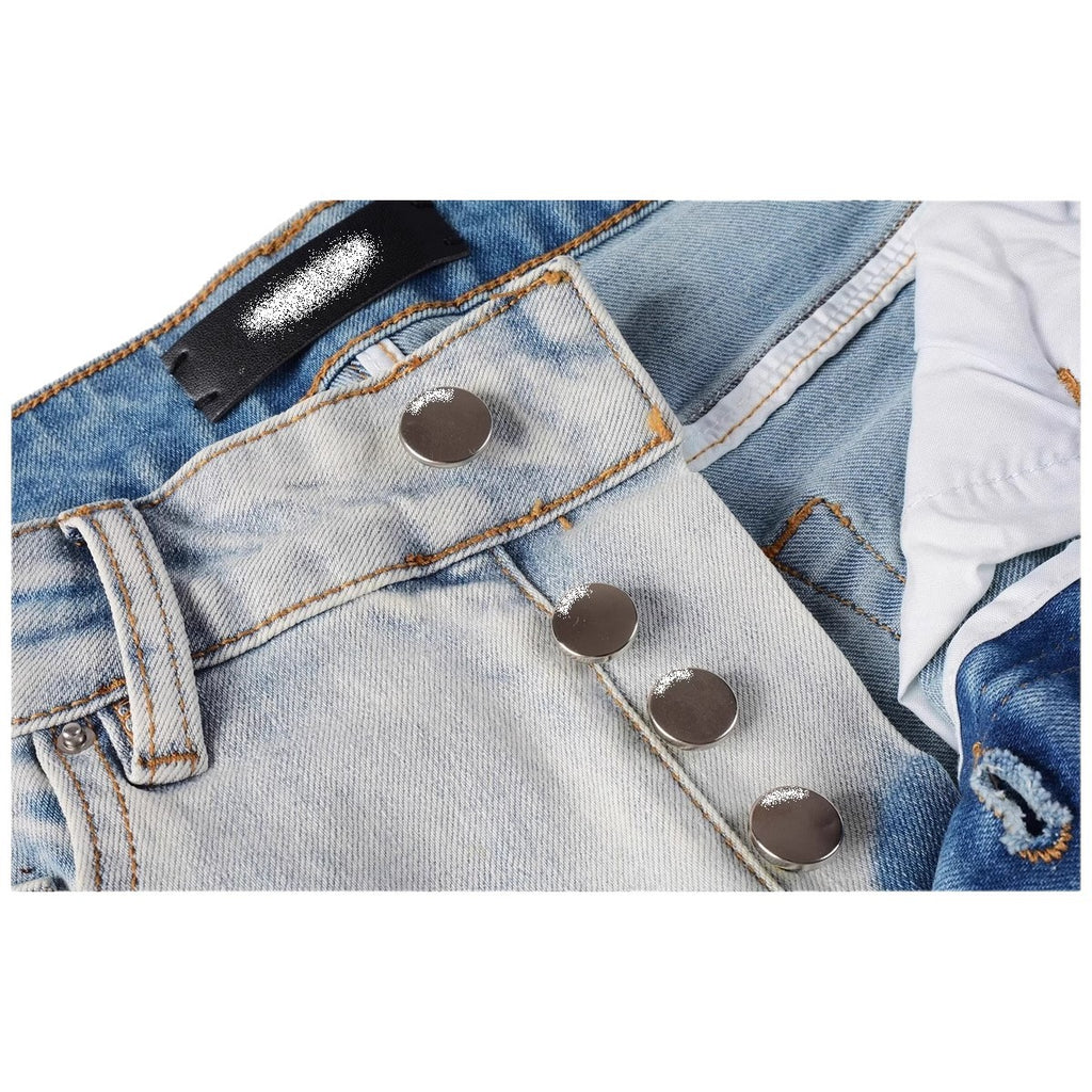 Distressed red patched jeans